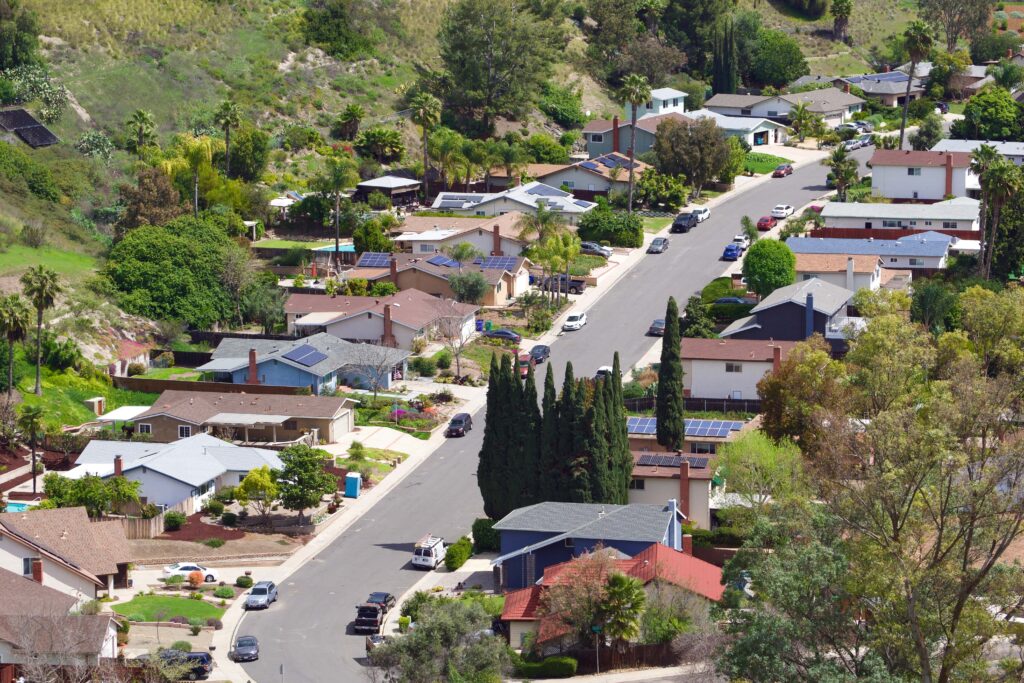 neighborhood-houses-and-homes-in-a-valley-on-a-hill